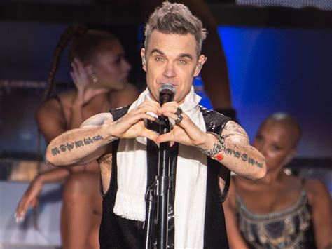 Il Roast di Robbie Williams: Un Concerto-Evento Indimenticabile e Travolgente!